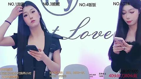 Media: Video of a slim East Asian woman with long black hair, wearing a black dress, holding a smartphone, in a professional setting.