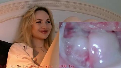 Media: A video of a blonde woman with fair skin, wearing a light jacket, smiling in a bedroom. On the right, a close-up of a white, sticky substance resembling semen. Text at the bottom reads \"Fear: No Better Way to Get Rid of It.\