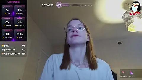 Media: Video of a young woman with glasses and light brown hair, wearing a white shirt, standing in a dimly lit room with a colorful, cartoonish virtual character in the top right corner.