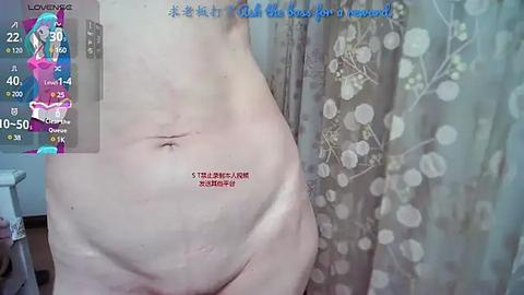 Media: A video showing a naked, overweight person with fair skin, standing in a bathroom with a floral-patterned shower curtain. The person's stomach has a red \"XL\" tattoo.