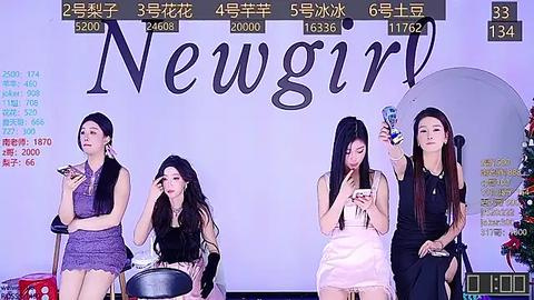 Media: Video of four Asian women in glamorous outfits, holding microphones, on stage, with \"New Girl\" written in large letters on a white backdrop.