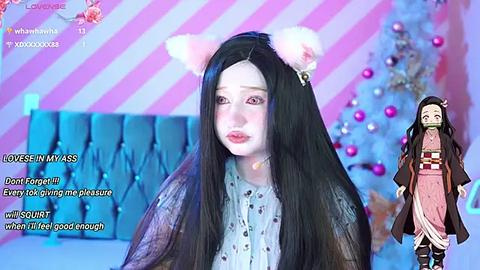 Media: Video of a pale-skinned, long-haired woman with pink cat ears, wearing a light blue dress with a black jacket. Background includes a pink-striped wall, a Christmas tree, and a poster of a Japanese anime character. Text reads, \"LOL, MY ASS IS HURTING, DON'T FORGET TO GIVE PLEASURE WITH PLEASURE WITH PLEASURE WITH PLEASURE WITH PLEASURE WITH PLEASURE WITH PLEASURE WITH PLEASURE WITH PLEASURE WITH PLEASURE WITH PLEASURE WITH PLEASURE WITH PLEASURE WITH PLEASURE WITH PLEASURE WITH PLEASURE WITH PLEASURE WITH PLEASURE WITH PLEASURE WITH PLEASURE WITH PLEASURE WITH PLEASURE WITH PLEASURE WITH PLEASURE WITH PLEASURE WITH PLEASURE WITH PLEASURE WITH PLEASURE WITH PLEASURE WITH PLEASURE WITH PLEASURE WITH PLEASURE WITH PLEASURE WITH PLEASURE WITH PLEASURE WITH PLEASURE WITH PLEASURE WITH PLEASURE WITH PLEASURE WITH PLEASURE WITH PLEASURE WITH PLEASURE WITH PLEASURE WITH PLEASURE WITH PLEASURE WITH PLEASURE WITH PLEASURE WITH PLEASURE