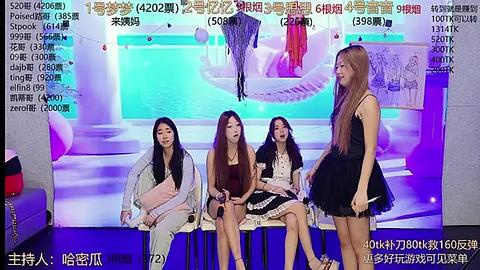 Media: Video of four young Asian women in formal attire, seated on a stage, against a colorful, abstract backdrop, with text and subtitles in Chinese.