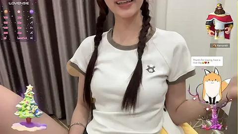 Media: A young woman with long braided hair, wearing a white t-shirt, sits in a room. AR filters overlay a Christmas tree and a fox, with a chat bubble saying \"Thank you for being a friend.\